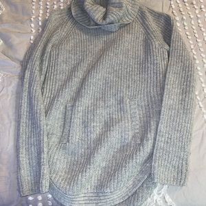 Grey cow neck sweater with cool zippered side